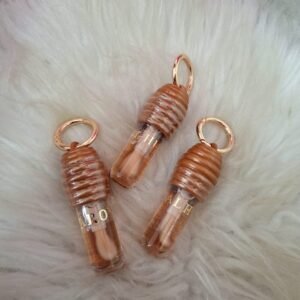 LIP OIL MEL COM CHAVEIRO HUDA ROYAL